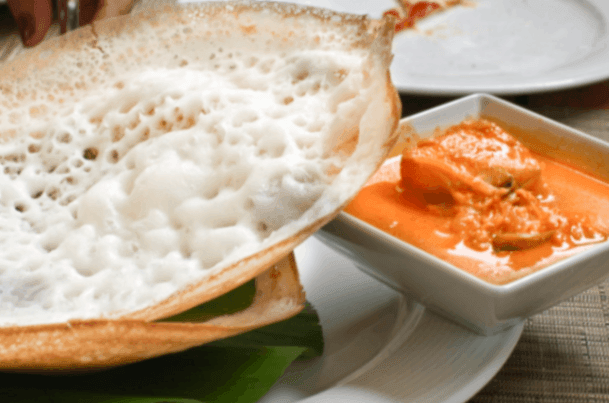 Appam And Fish Mango Curry in Thrissur