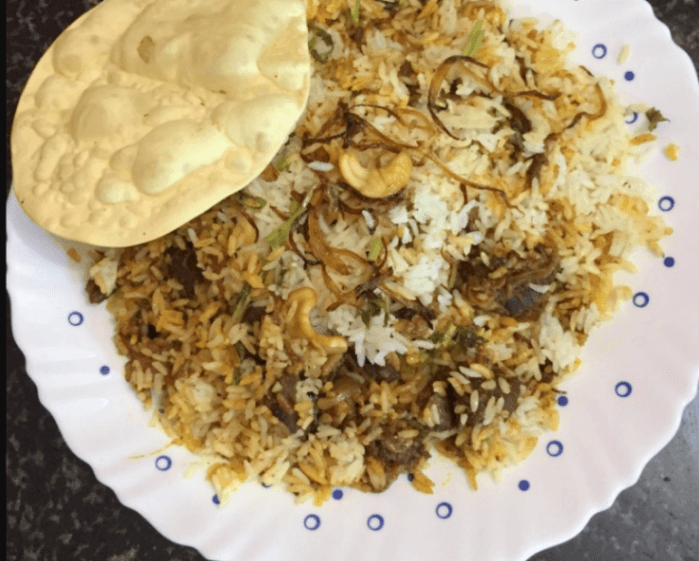 Beef Dum Biryani at Hotel Madeena, Tirur