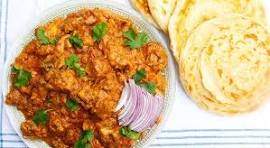 Butter Chicken With Tawa Paratha in Kochi