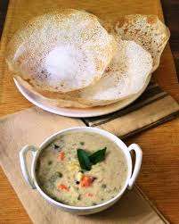 Appam With Vegetable Stew in Thiruvananthapuram